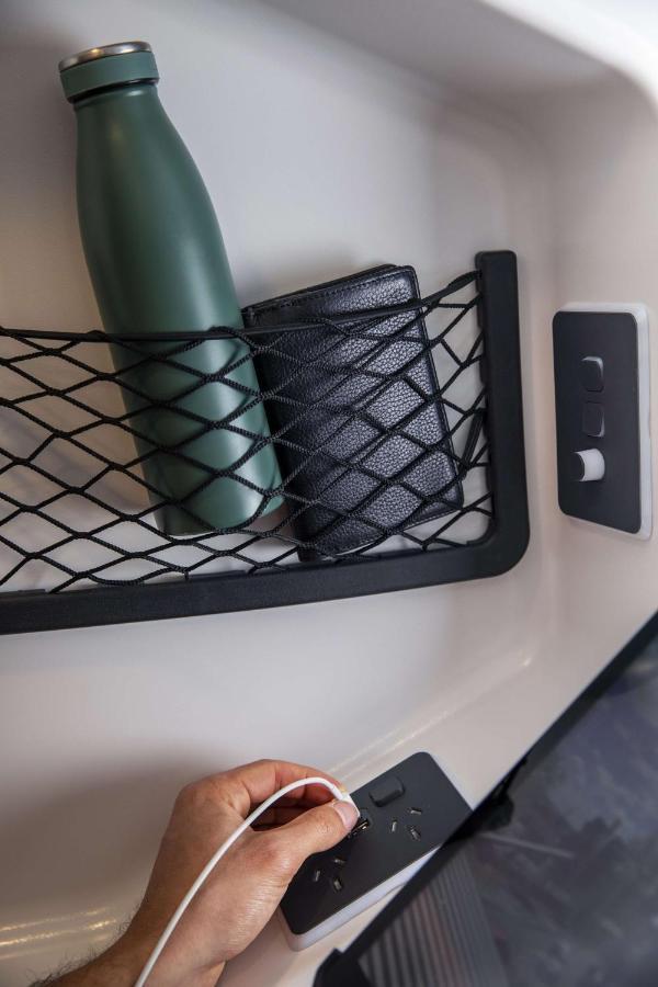 Lylo Auckland Hotel Экстерьер фото A wallet and a mobile phone in a train pocket